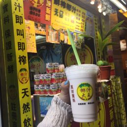 Large cup of coconut juice (22 HKD/$3)! So refreshing! Get this and eat with the other small eats! Large cup of coconut juice (22 HKD/$3)! So refreshing! Get this and eat with the other small eats!
