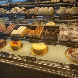 a display of cakes and pastries