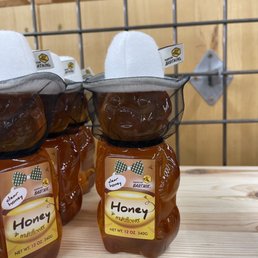 Honey with bee keeper mask