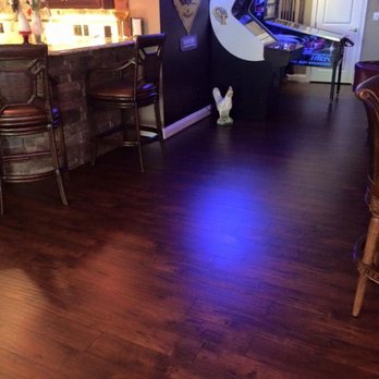 Classic Carpets & Flooring - a dark wood floor in a restaurant - Carpeting Near Me - Fairfield, Ohio Classic Carpets & Flooring - a dark wood floor in a restaurant - Carpeting Near Me - Fairfield, Ohio