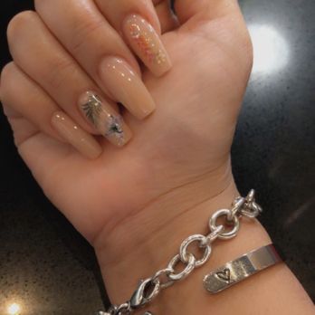 Vivien Nails - Nude nail color with flower  design - Nail Salons Near Me - Katy, Texas