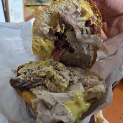 Gino Cacino di Angelo - Porketta on a perfecr crispy roll with mustard cream, honey and sun dried tomatoes. UNBELIEVABLE!