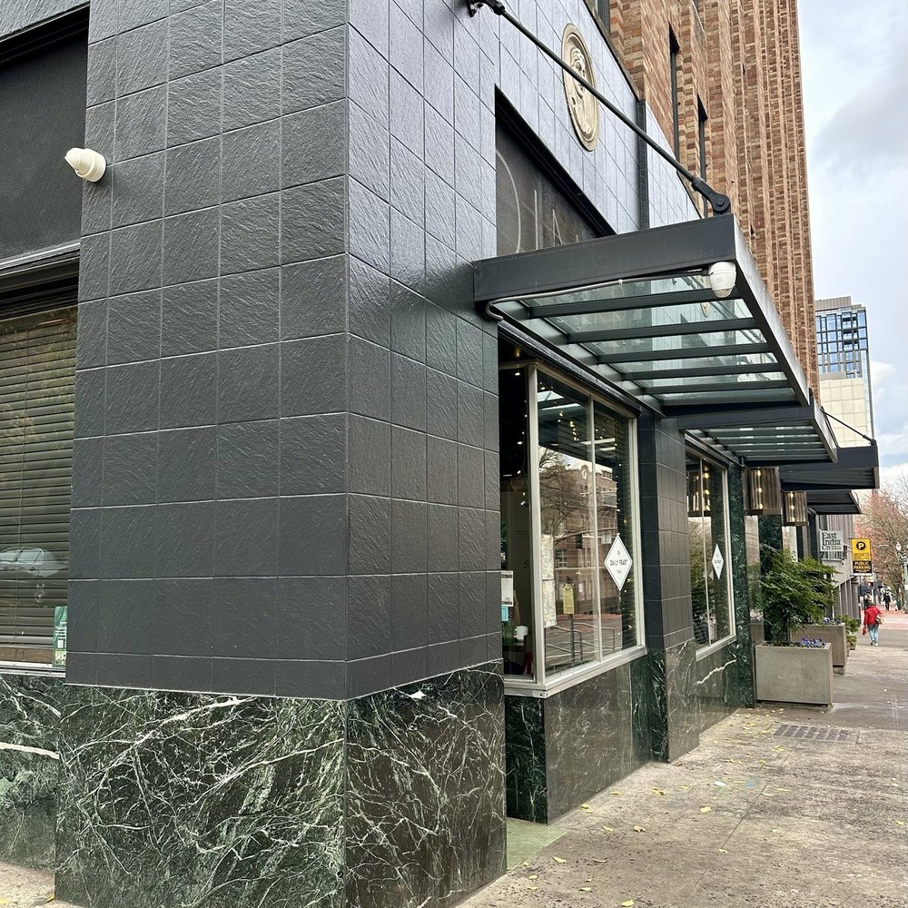 Outside looks sleek and sterile, inside is way more inviting Outside looks sleek and sterile, inside is way more inviting