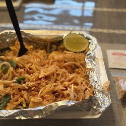 Thai Law - Pad Thai with chicken. Big portion which my fat butt loved! They give you the peanuts and chili flakes on the side. Chicken tasted fresh.