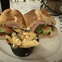Italian sub with side of house pasta salad