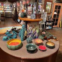 Stone House of Tubac - Pottery table facing front door & back gallery