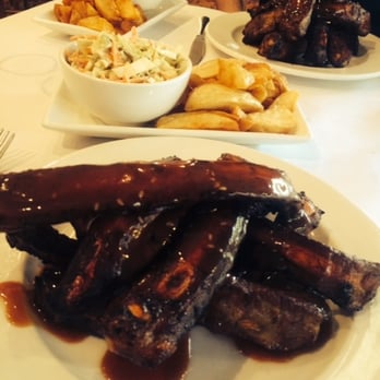 Stanley Bridge Tavern - Benny's famous ribs with fancy slaw and crunchy yummy wedges - Bars Near Me - Verdun, SA Stanley Bridge Tavern - Benny's famous ribs with fancy slaw and crunchy yummy wedges - Bars Near Me - Verdun, SA