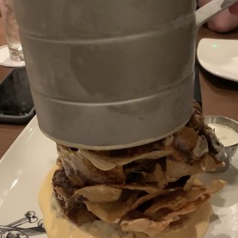 Guy Fieri's Cherokee Kitchen + Bar - Trash Can Nachos!! - New American Near Me - Cherokee, North Carolina Guy Fieri's Cherokee Kitchen + Bar - Trash Can Nachos!! - New American Near Me - Cherokee, North Carolina