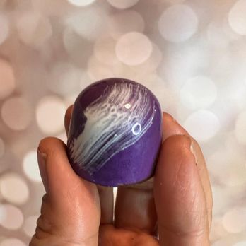 RU Chocolate  -  hand holding a purple marble - Chocolatiers & Shops Near Me - Dallas, Texas