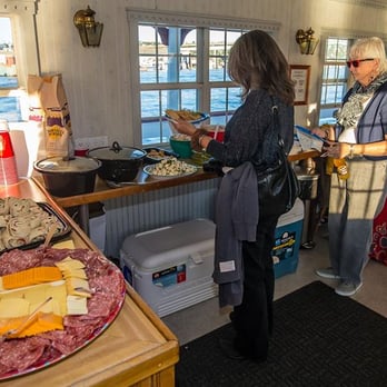 Sternwheeler Charters - Plenty of room to set up an appetizer buffet (and bar) inside the lower deck - Boat Charters Near Me Sternwheeler Charters - Plenty of room to set up an appetizer buffet (and bar) inside the lower deck - Boat Charters Near Me