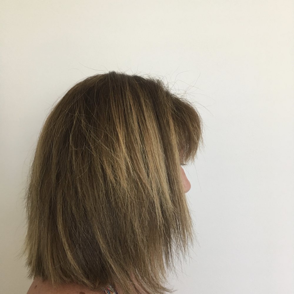 No caramel at  bottom as requested just patchy blonde asymmetrical rt to left  haircut . Nothing like the slant cut or colour I asked for.