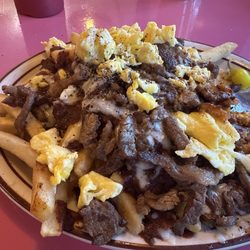 Chili cheese fries. (Added carne asada with scrambled eggs).