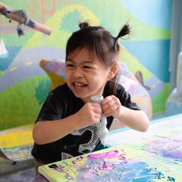 The birthday girl having fun painting the canvases we got to take home The birthday girl having fun painting the canvases we got to take home