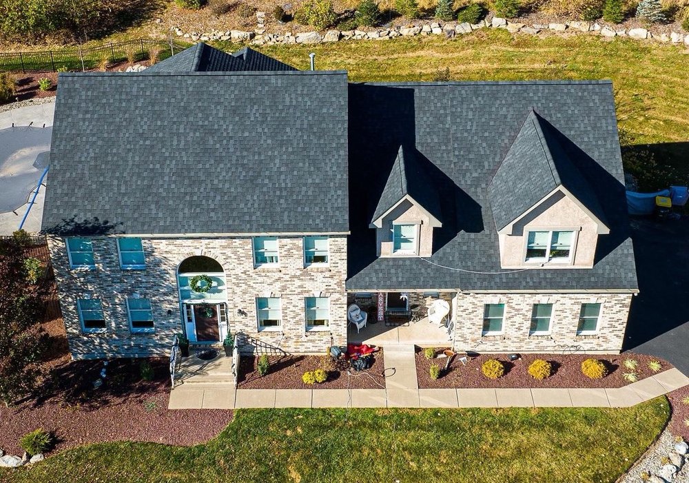 Slide of Alpha and Omega Roofing