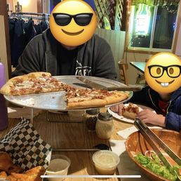 Bacon and mushroom pizza, garden salad with Italian dressing, hot wings with buffalo sauce Bacon and mushroom pizza, garden salad with Italian dressing, hot wings with buffalo sauce