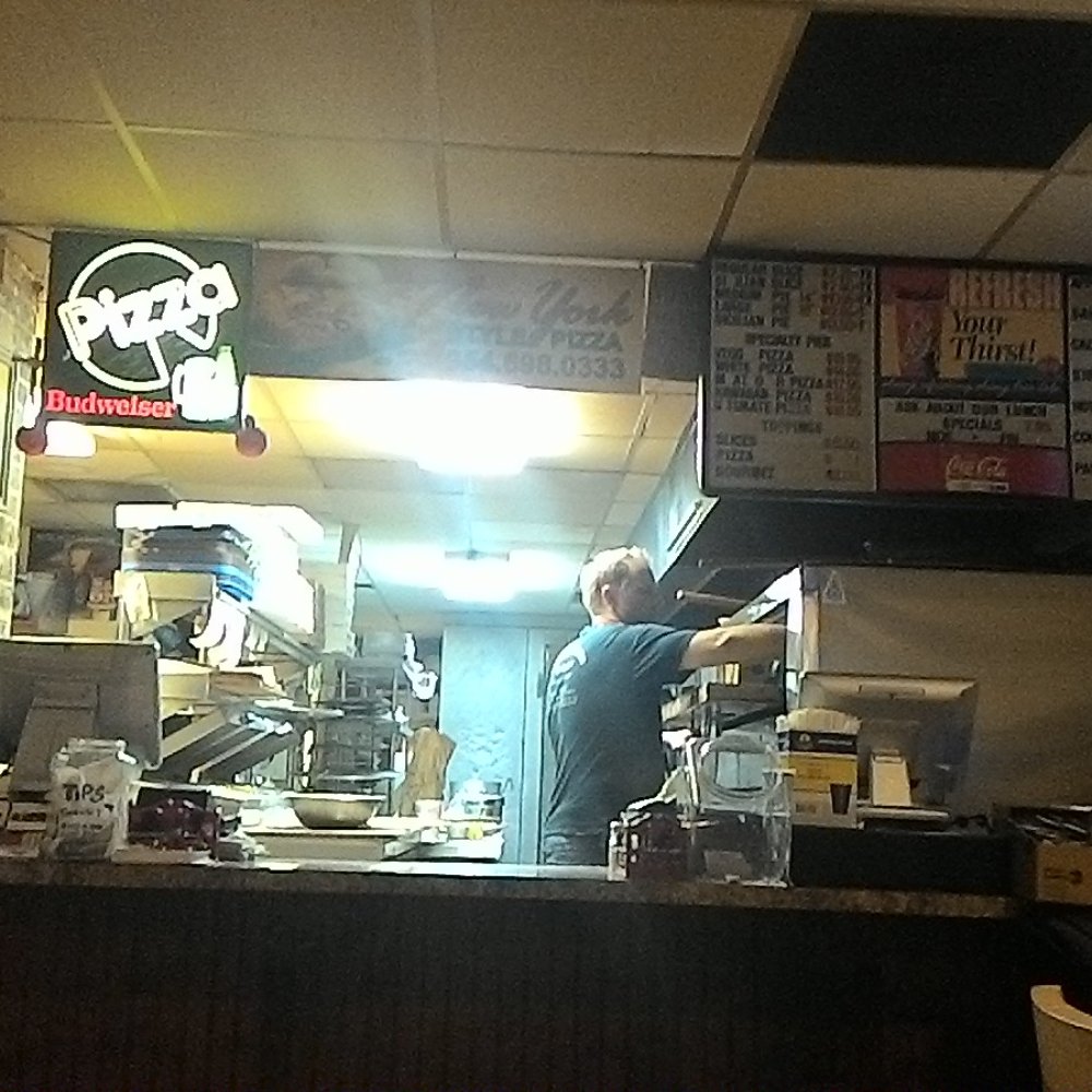 Nick's Pizza - Watching them make pizza - Pizza Near Me - Deerfield Beach, Florida Nick's Pizza - Watching them make pizza - Pizza Near Me - Deerfield Beach, Florida