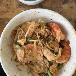 The dry hu tieu with a combo of wide white noodle and thin yellow noodle. Tons of different meat with two large prawns!