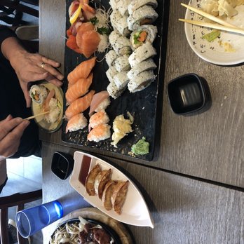 Momo Sushi - 4 person boat. Comes with sashimi, sushi, salad, soup, teriyaki chicken , vegetable tempura and fried dumpling. More than enough food. - Sushi Bars Near Me - Vancouver, British Columbia