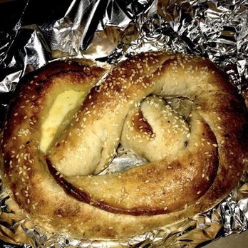 Slices Of Brooklyn - a pretzel wrapped in aluminum foil - Pizza Near Me - Brooklyn, New York Slices Of Brooklyn - a pretzel wrapped in aluminum foil - Pizza Near Me - Brooklyn, New York