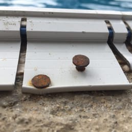 Rusted nails used on our new pool and sticking out Rusted nails used on our new pool and sticking out