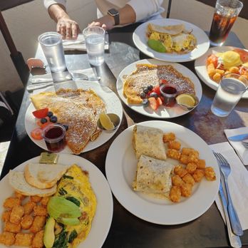 Brekkies - Bottom 2 plates: Vegetarian Omelet and Vegetarian Breakfast Burrito                               Middle 2 plates: Danish Pancakes - Breakfast & Brunch Near Me - Solvang, California