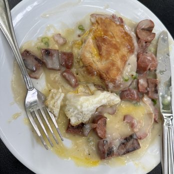 Evangeline - Biscuit and gravy with an added egg, it comes with andouille sausage. - Cajun/Creole Near Me - Calistoga, California Evangeline - Biscuit and gravy with an added egg, it comes with andouille sausage. - Cajun/Creole Near Me - Calistoga, California