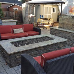 Granite Mafia and Cornerstone Granite - Outdoor fire pit, water feature and kitchen in natural stone