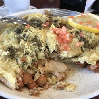 Baghdad Restaurant - Tashreeb bagella, an Iraqi breakfast dish, this is an omelet on top otherwise it has no meat. - Middle Eastern Near Me - Denver, Colorado