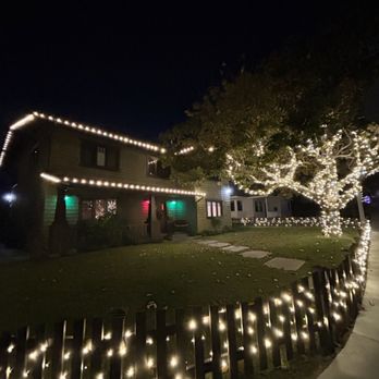 Holiday Light Installations - Gorgeous home, tree, and gate lit up! - Holiday Decorating Services Near Me