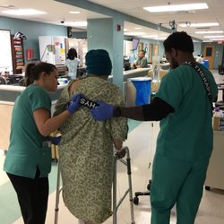 Fort Walton Beach Medical Center - Staff of PT helping mom get walking again.