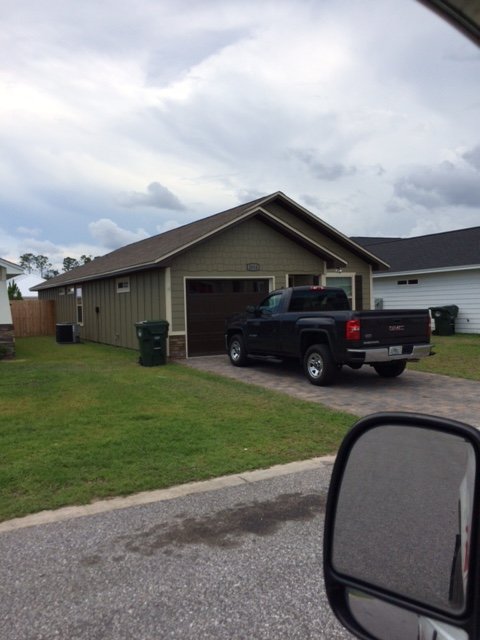 Slide of Greg's Roofing Of Bay County