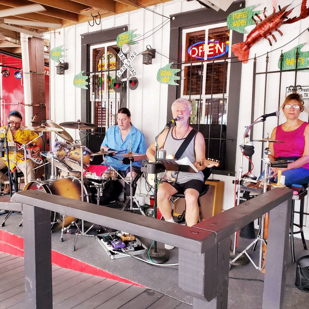 The Loose Caboose - a group of people playing music - Barbeque Near Me - Spring, Texas The Loose Caboose - a group of people playing music - Barbeque Near Me - Spring, Texas
