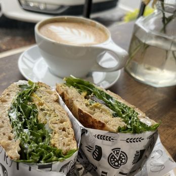 Milo’s Cafe - Veggie sandwich neatly wrapped for the juicy fillings! - Cafes Near Me - Morrisville, North Carolina