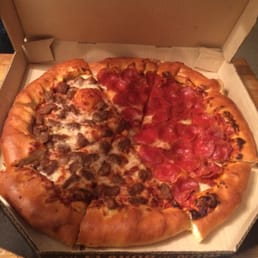 a pizza in a pizza box a pizza in a pizza box