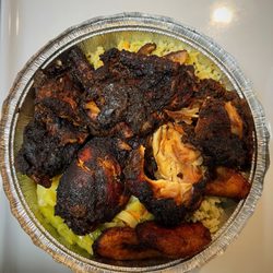 D & S Caribbean Kitchen - Jerk chicken with spinach rice, plantains, and steamed cabbage