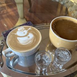 Caffe Amadeus - Organic Coffee and black and gold latte!!