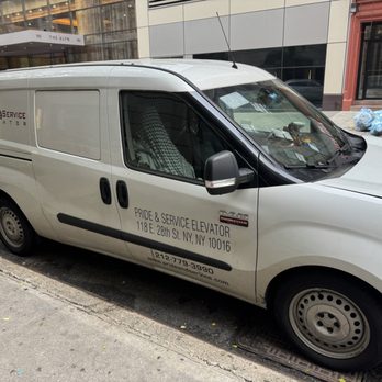 Pride & Service Elevator Company - Keffya (kinda what a nazi flag) in their van - Elevator Services Near Me - New York, New York Pride & Service Elevator Company - Keffya (kinda what a nazi flag) in their van - Elevator Services Near Me - New York, New York