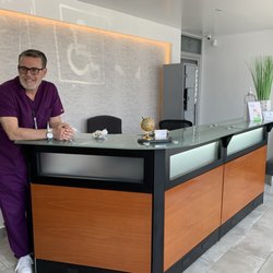 Dr. Orlando Acosta - Dr. Orlando standing in the refurbished and expanded lobby.