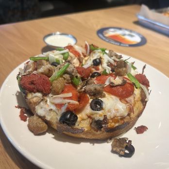 BJ's Restaurant & Brewhouse - Mini Deep Dish Pizza - New American Near Me - Bakersfield, California