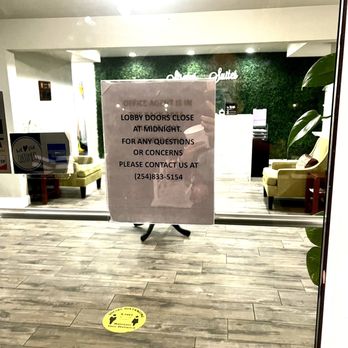 Stratus Suites - Sign is posted with an on-call phone number, however if you call, they still aren't able to unlock the lobby. - Hotels Near Me - Killeen, Texas Stratus Suites - Sign is posted with an on-call phone number, however if you call, they still aren't able to unlock the lobby. - Hotels Near Me - Killeen, Texas
