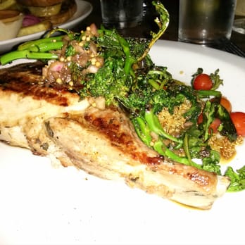 Nopa - Pork chop, broccoli di ciccio, mini charm tomatoes, and toasted quinoa - New American Near Me - San Francisco, California Nopa - Pork chop, broccoli di ciccio, mini charm tomatoes, and toasted quinoa - New American Near Me - San Francisco, California