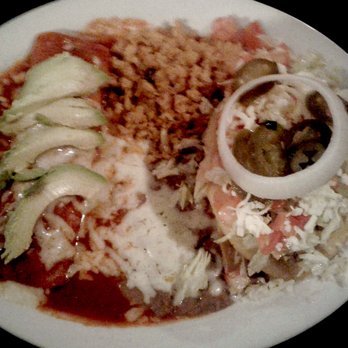 Vivo - Emma's Choice with Chipotle enchiladas and piccadillo puffy taco. Mmmmm!!! - Tex-Mex Near Me - Austin, Texas