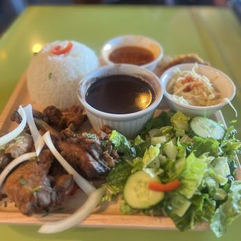 PiBonAn - a plate of food on a table - Haitian Near Me - Holbrook, Massachusetts