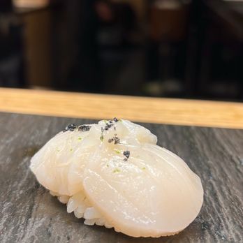 Takumi Omakase - Sea Scallop with Truffle Sea Salt and Lime Juice - Sushi Bars Near Me - New York, New York Takumi Omakase - Sea Scallop with Truffle Sea Salt and Lime Juice - Sushi Bars Near Me - New York, New York