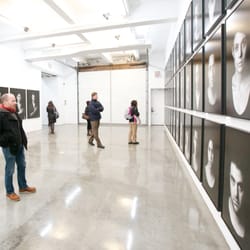 New York Art Tours - Shirin Neshat's wall of portraits commemorating the Arab Spring gave pause for thought.