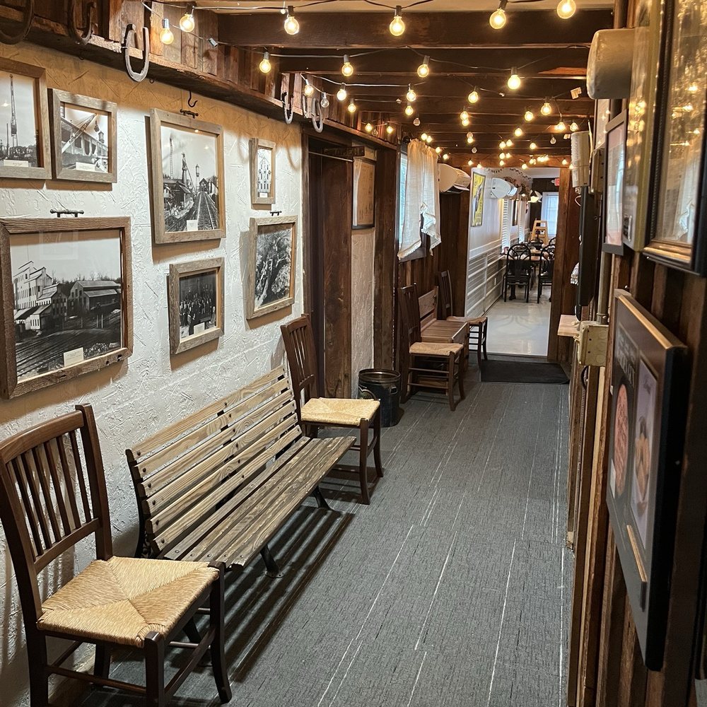 Beacon Light Tea Room - More seating down the hall from the main dining area- cool historic photos too - Tea Rooms Near Me - Bon Aqua, Tennessee