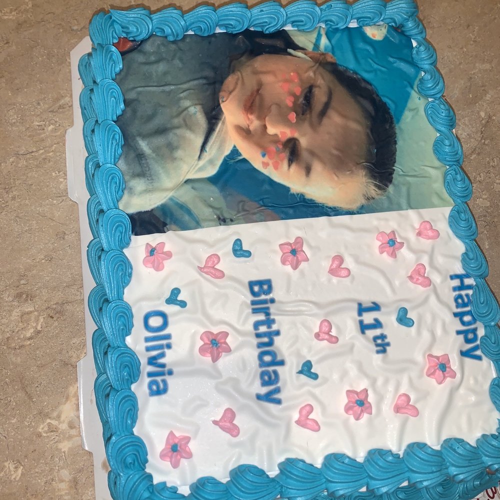 a photo of a baby on a sheet cake a photo of a baby on a sheet cake