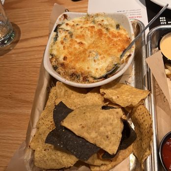 Crust Brewing - Spin art dip definitely needs more chips! And was pretty greasy. - Breweries Near Me - Rosemont, Illinois