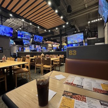 Buffalo Wild Wings - the inside of a restaurant - American Near Me - Charlottesville, Virginia Buffalo Wild Wings - the inside of a restaurant - American Near Me - Charlottesville, Virginia