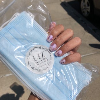 Liz Nail & Spa - Extension w/ gel polish + foil&glitter coat in outdoors lighting. Very sweet to provide complimentary face masks :) - Nail Salons Near Me - Flushing, New York